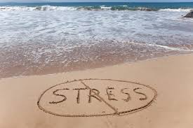Stress written in the sand crossed out